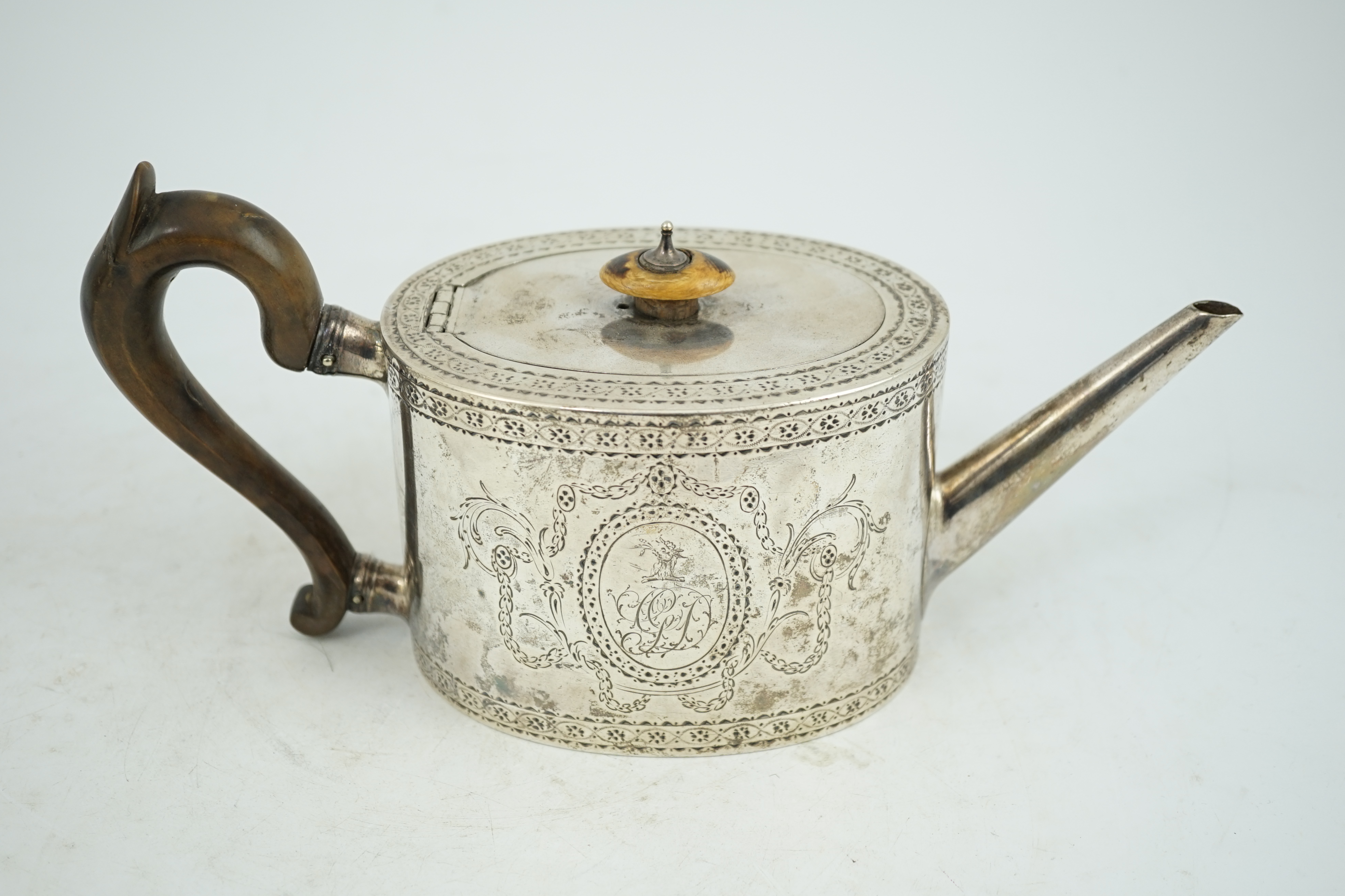 A George III engraved silver oval teapot, London, 1777, gross weight 16.5oz. CITES Submission reference KVNULT5X